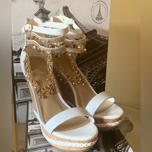 Brand new Summer Sandals with embellished trinkets.  Look good without effort!